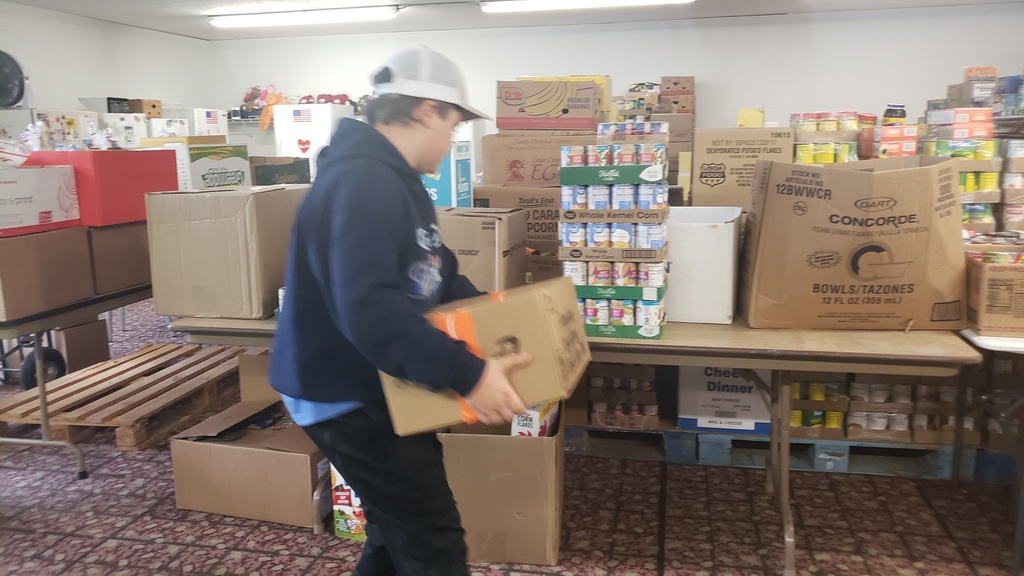 student setting box down