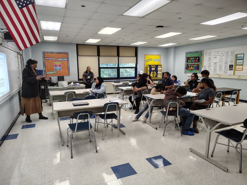 Mrs. Jenkins speaks with families