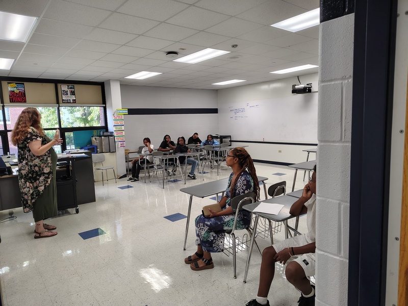 Ms. Parsons speaks with families
