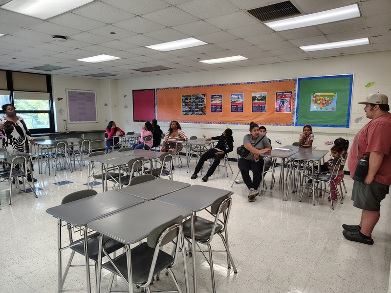 Ms. Hayes and Mr. Arellano welcome families at Open House