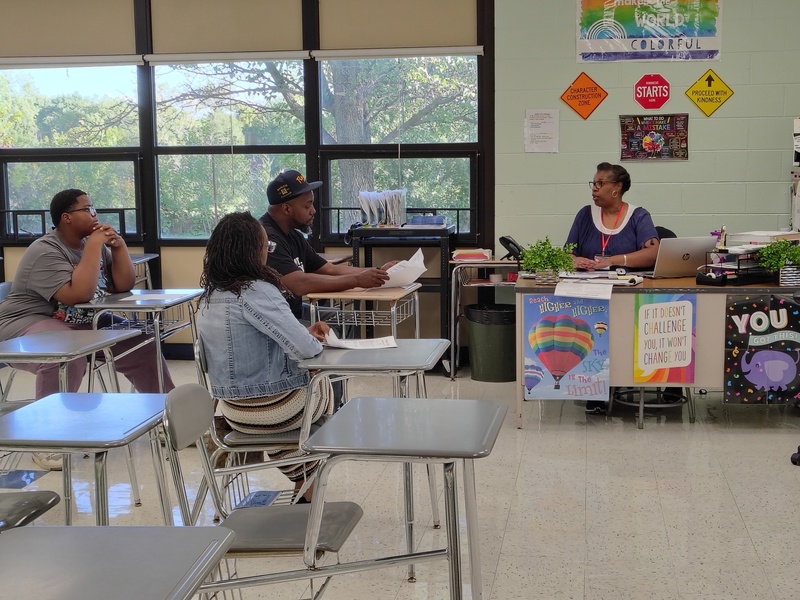 Ms. Fudge speaks with families