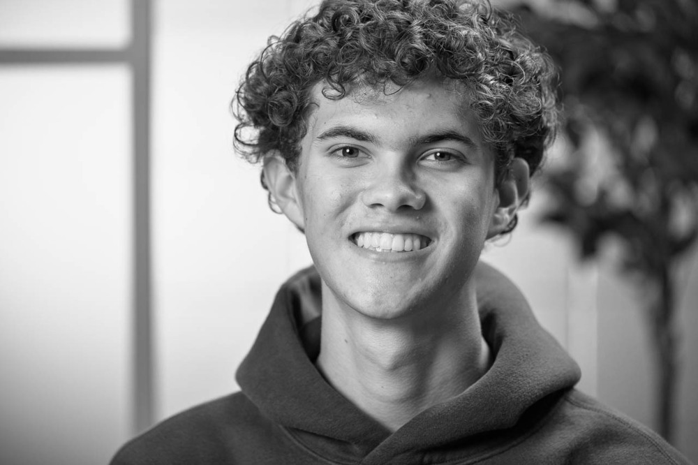 black and white headshot of Evan Kobb