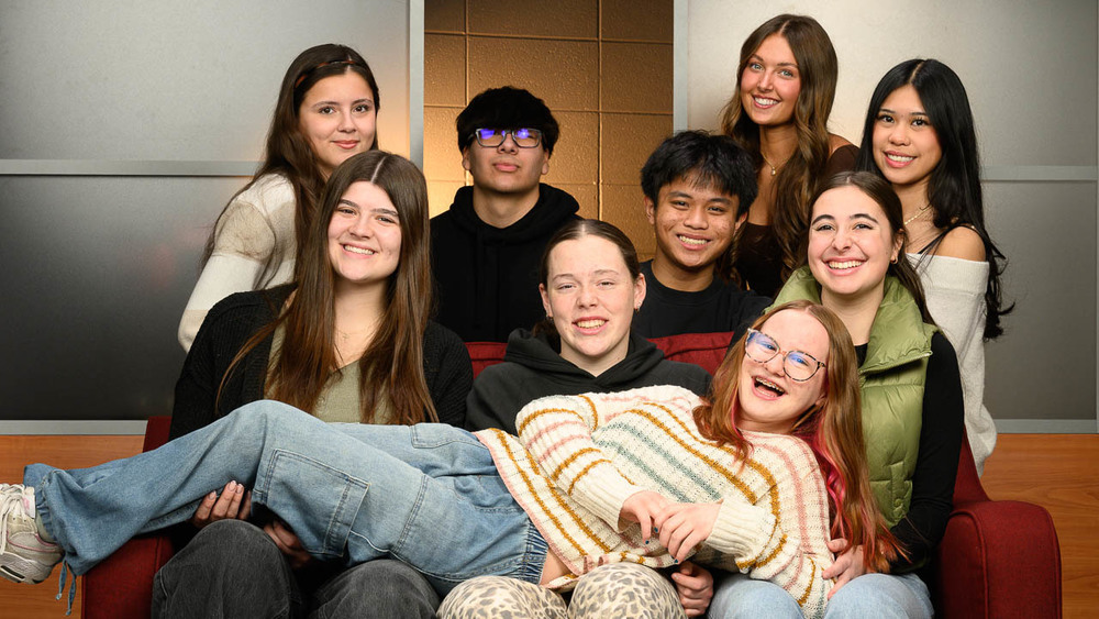 Group shot of students on and around a couch