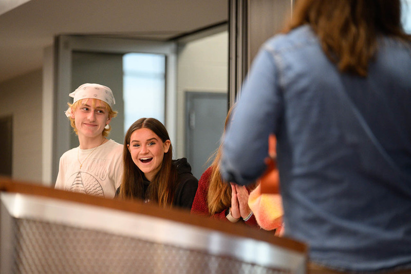 girl smiles at podium