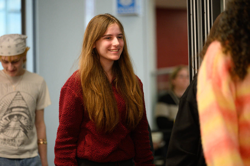 girl walks toward podium to receive award