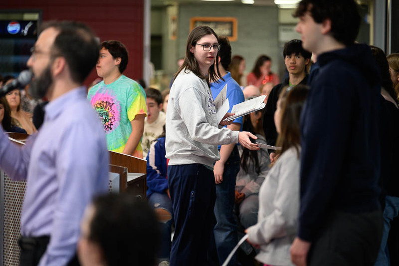 Student passes out awards