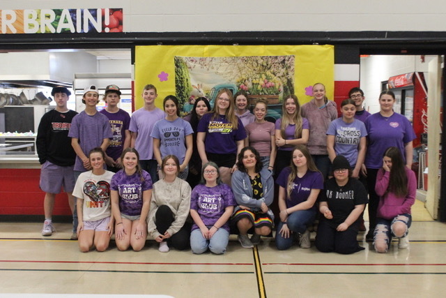 High school students in purple stand in a group wearing purple. 💜 Our students and staff proudly wore purple for Epilepsy Awareness Day to stand with those affected and spread understanding. 