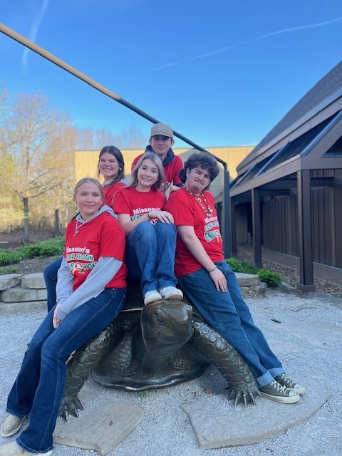 Community R-VI students competed at the Central Region Envirothon today. The contest consists of tests/stations and oral presentations covering soils, wildlife, forestry, aquatics, and current events of renewable resources. Pictured are Chloe Johnson, Cameron Delozier, Chris Lewis, Jocelyn Curtis and Matthew Utterback sitting on a giant turtle statue.