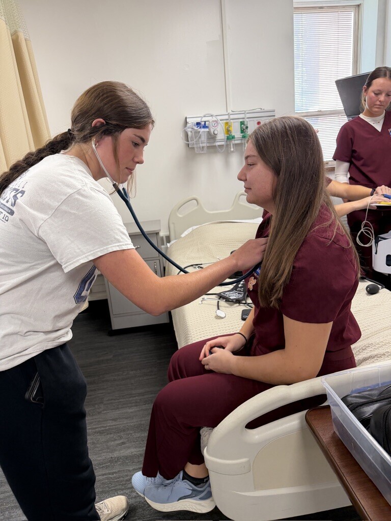 Future nurses in the making! Thanks to rootEd, students joined Mrs. Larson for an immersive nursing experience at Stephens College, where they checked vitals, used a stethoscope on high-tech patient simulators, and learned from real nursing students. A big thank you to Stephens College and Boone Health for hosting us!