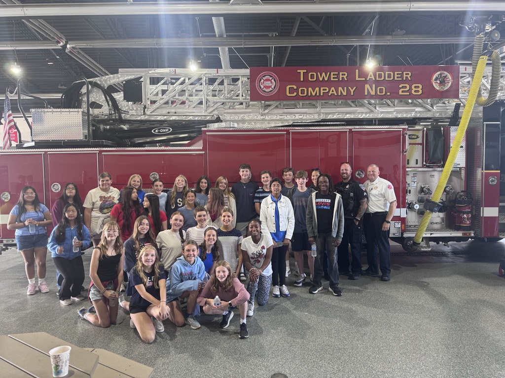 Edison students posing in front of fire truck
