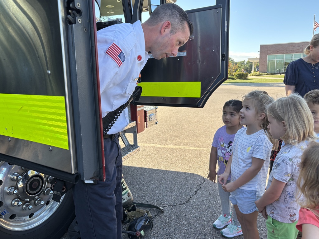 Firefighter talking with preschoolers