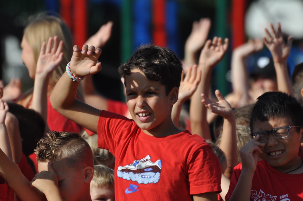 Boy in red shirt