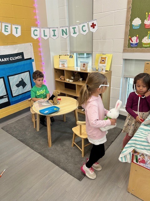 Kids playing in animal clinic