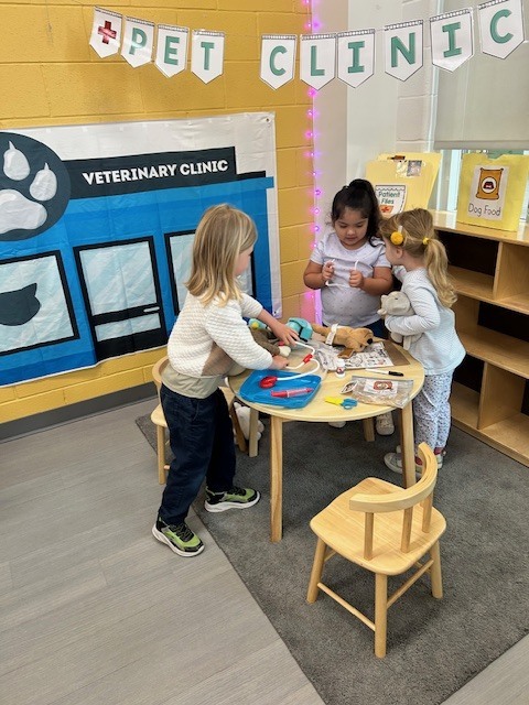 Kids playing in animal clinic