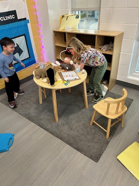 Kids playing in animal clinic