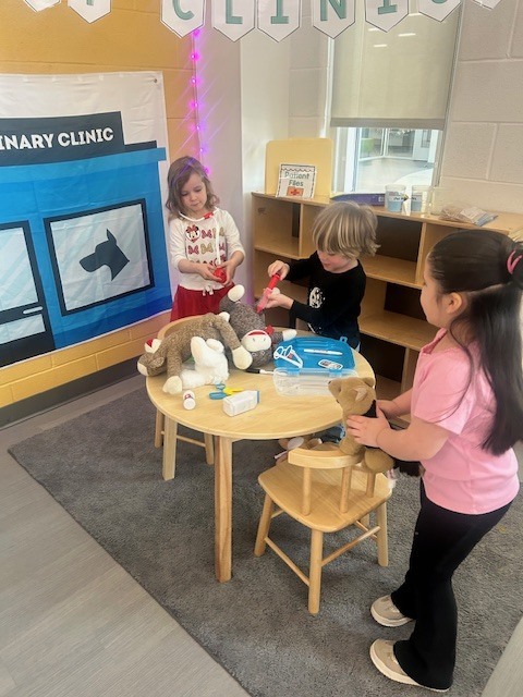 Kids playing in animal clinic