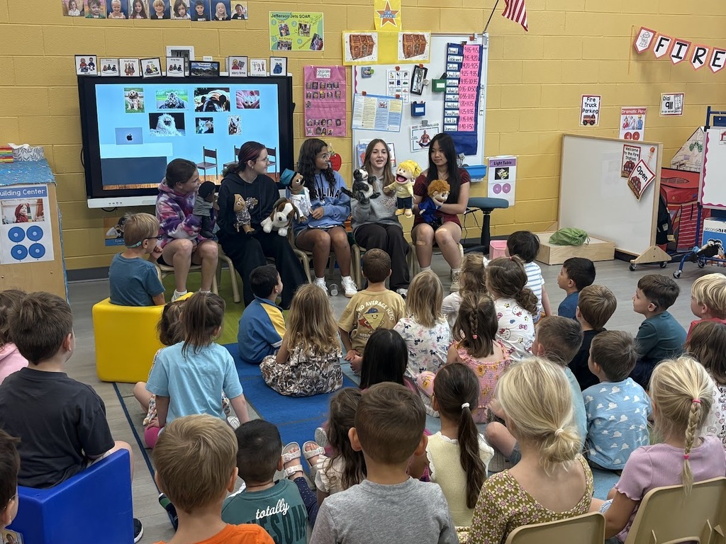 Middle school students perform puppet show