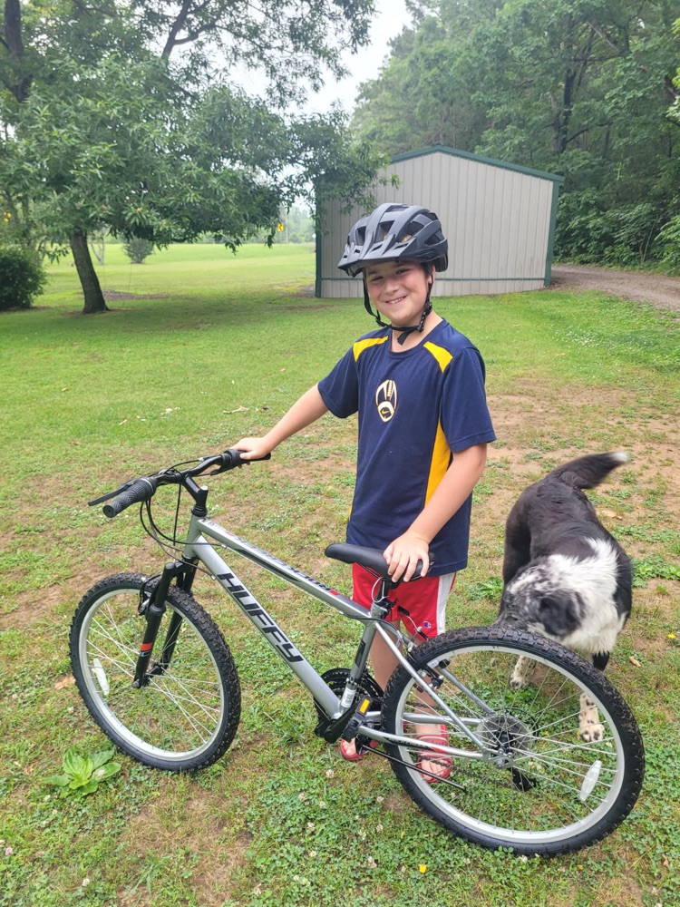 student with his bike
