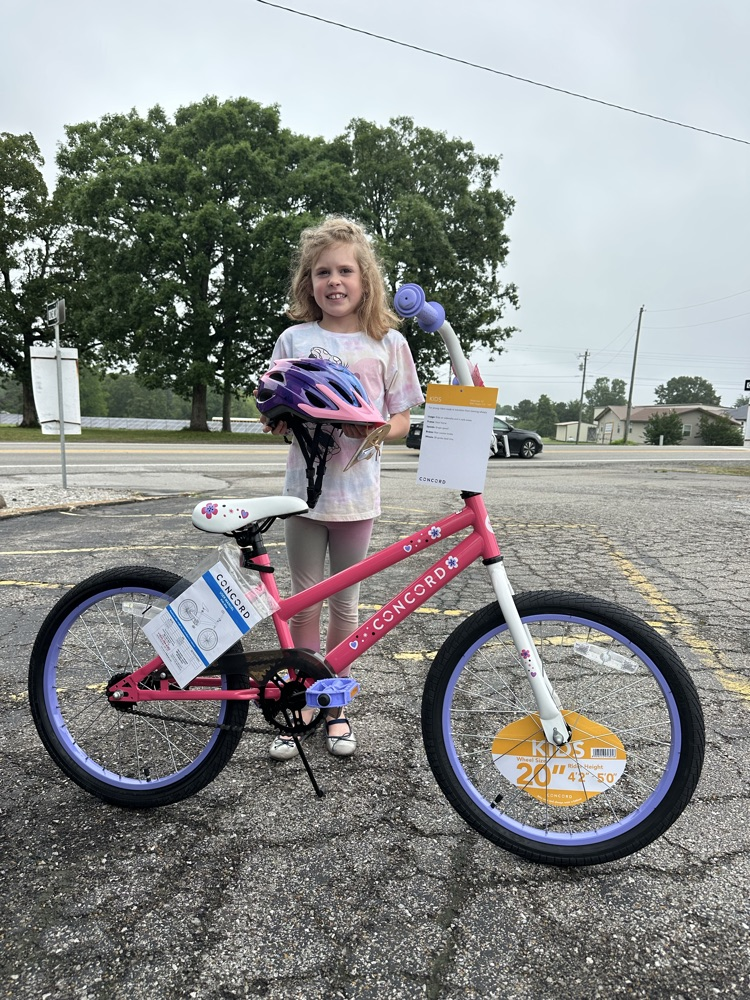 student with her bike