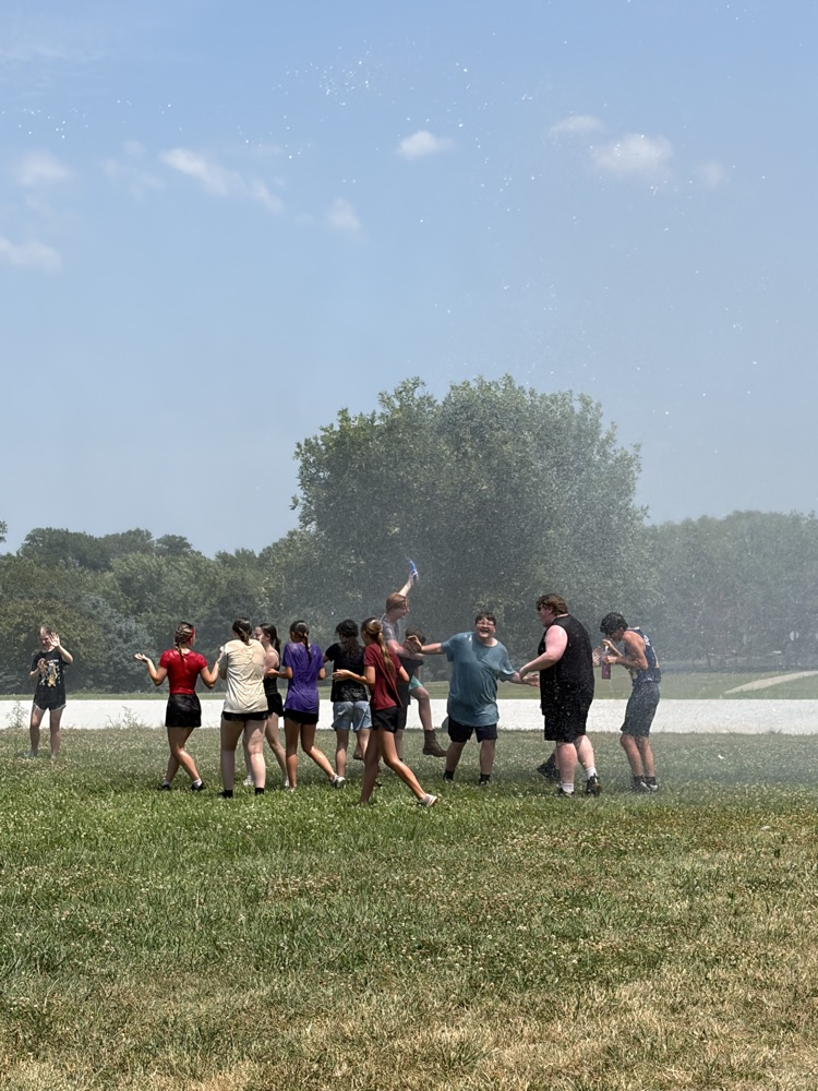 Students playing in water  