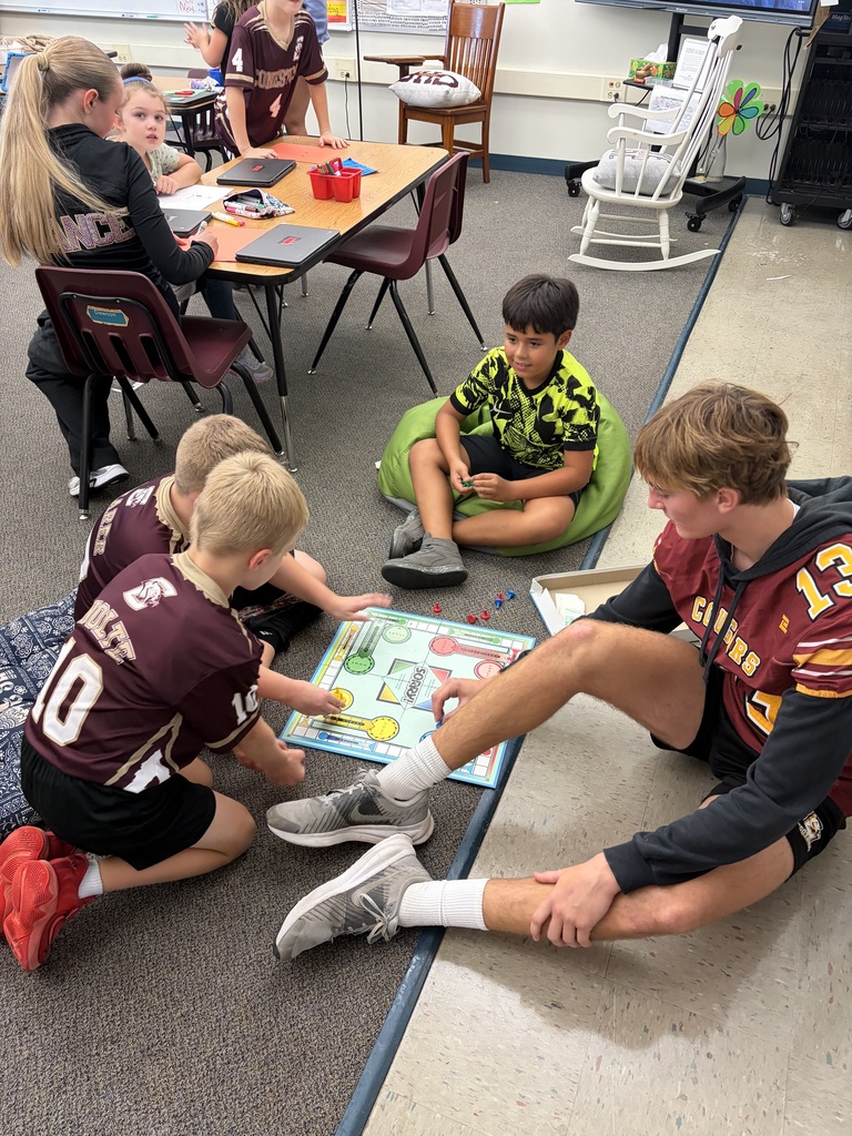 Students in a classroom doing a STEM project 