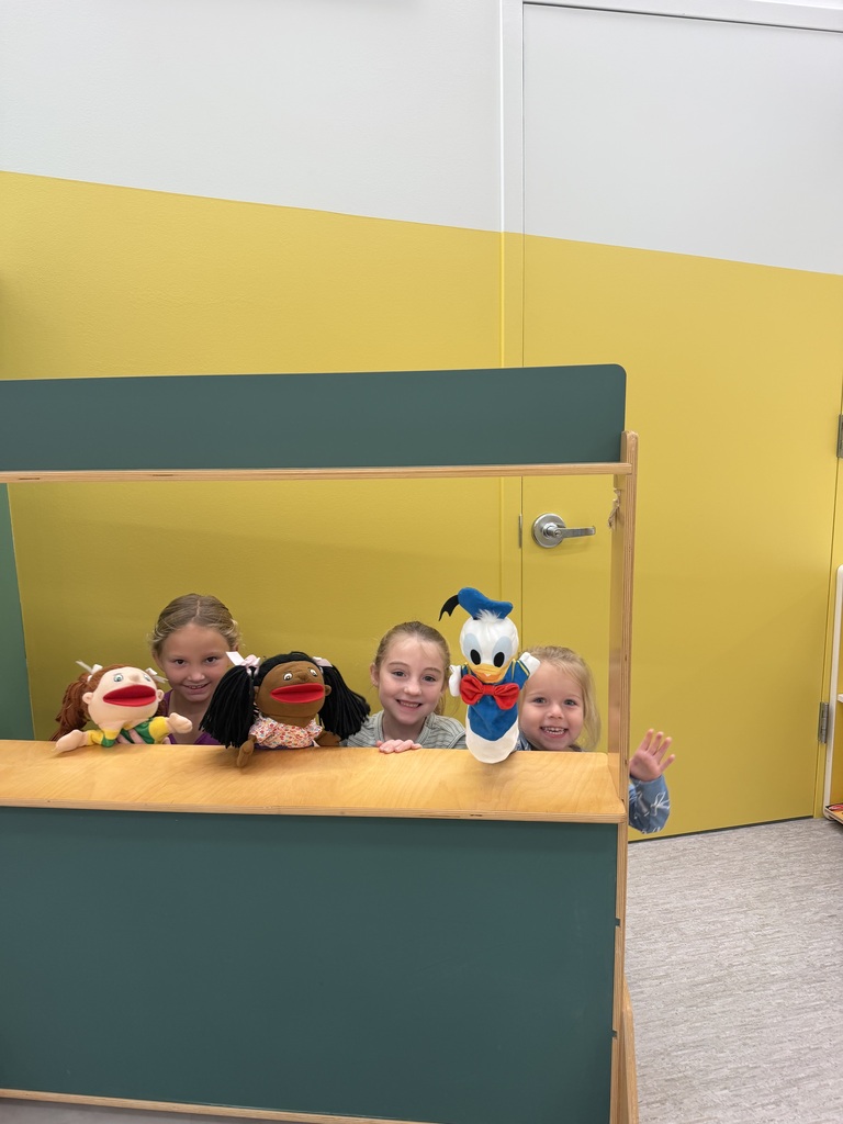 Kids doing puppet show