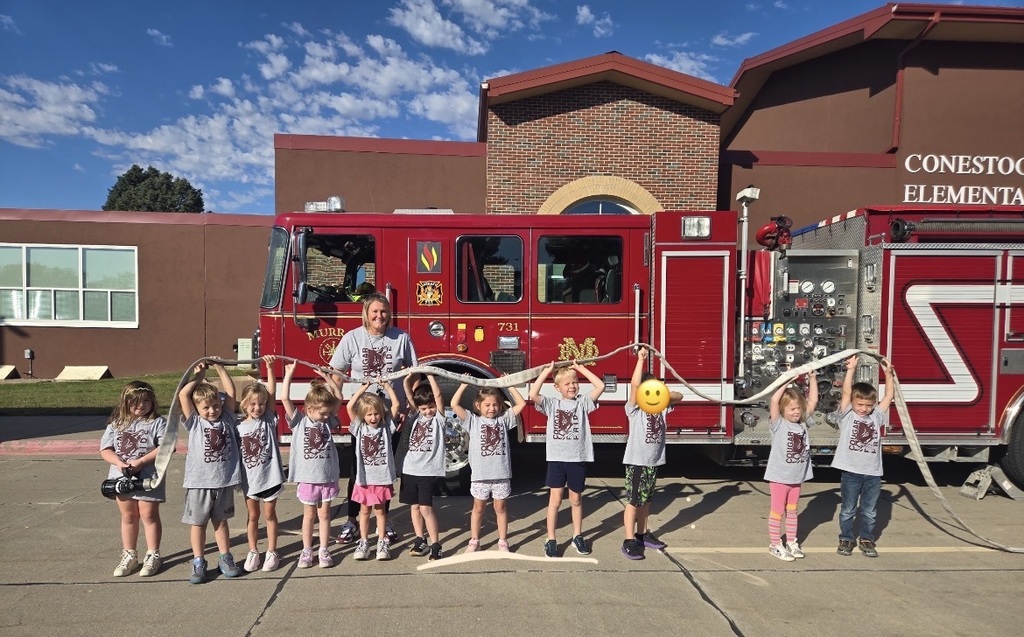 Kids in front of fire truck