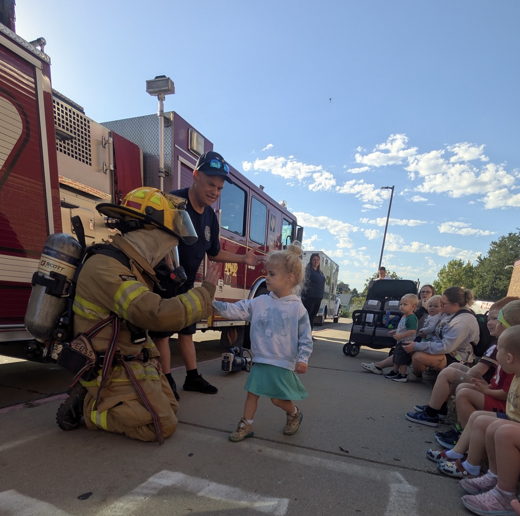 Kids in front of fire truck