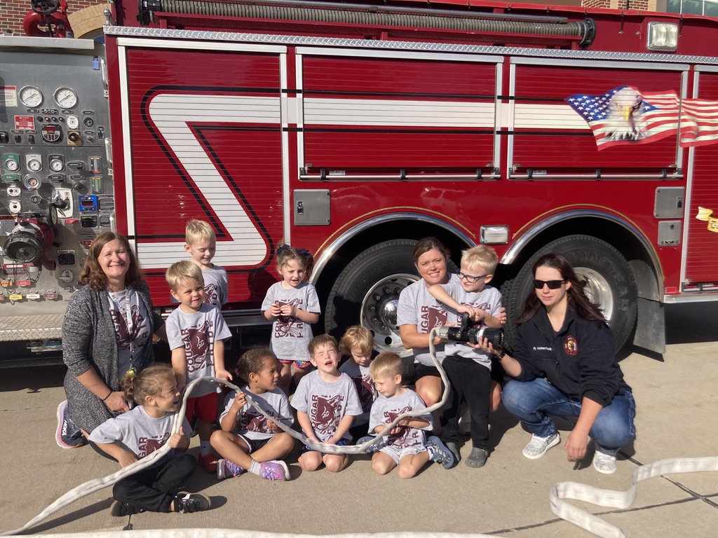Kids in front of fire truck