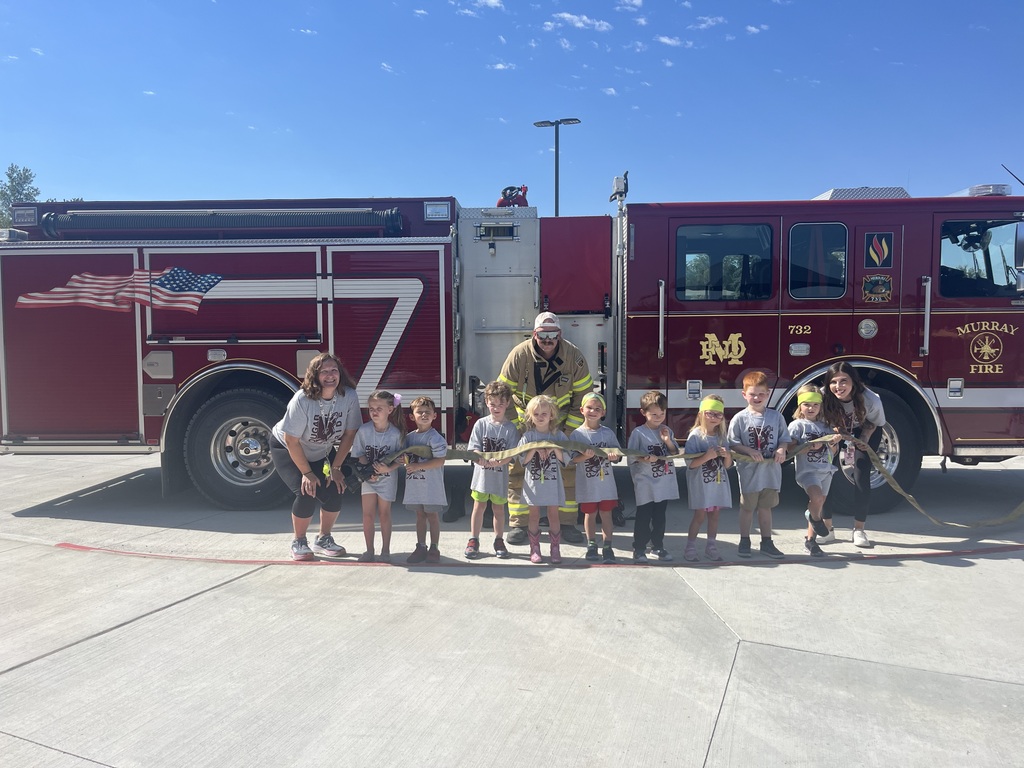 Kids in front of fire truck