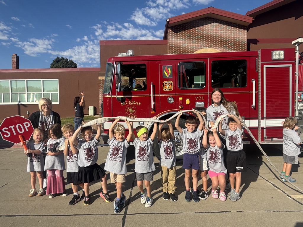 Kids in front of fire truck