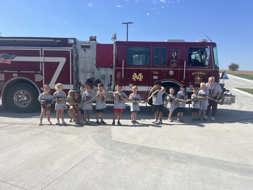 Kids in front of fire truck