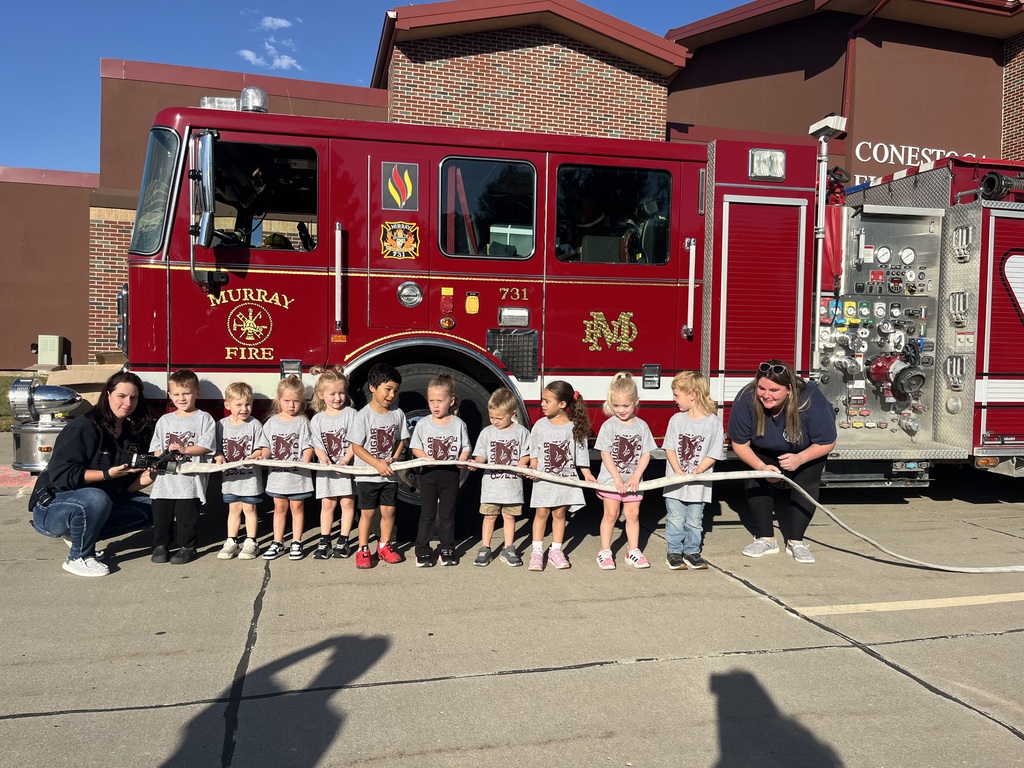Kids in front of fire truck