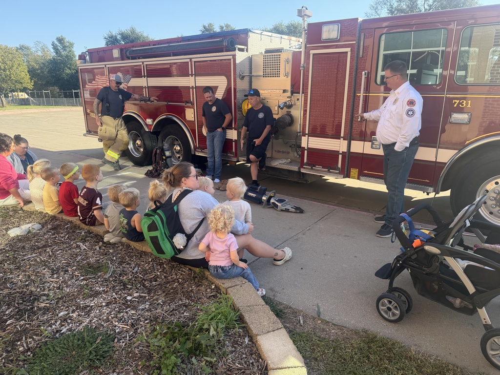 Kids in front of fire truck