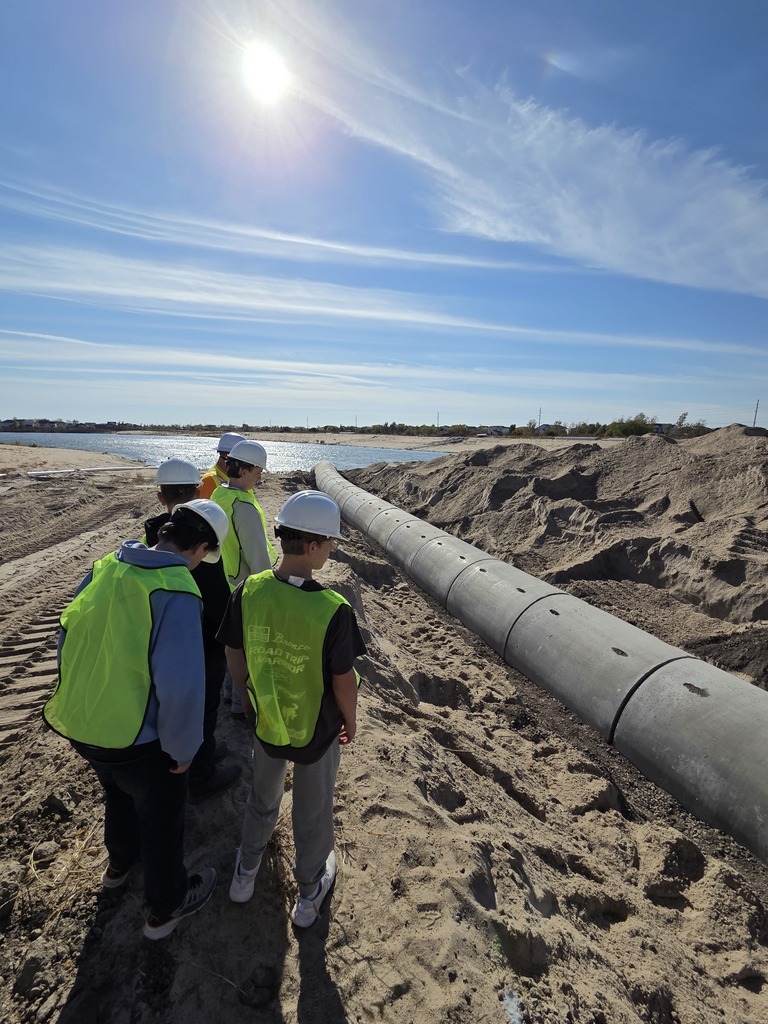 Students observing pipe work