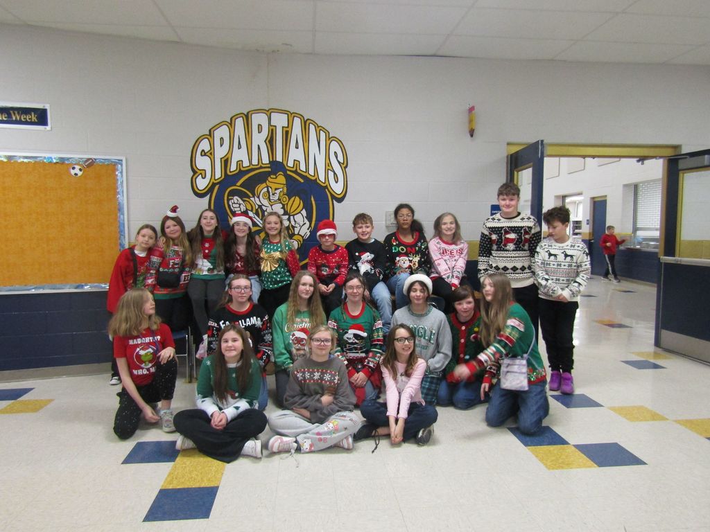 group of students wearing holiday apparel