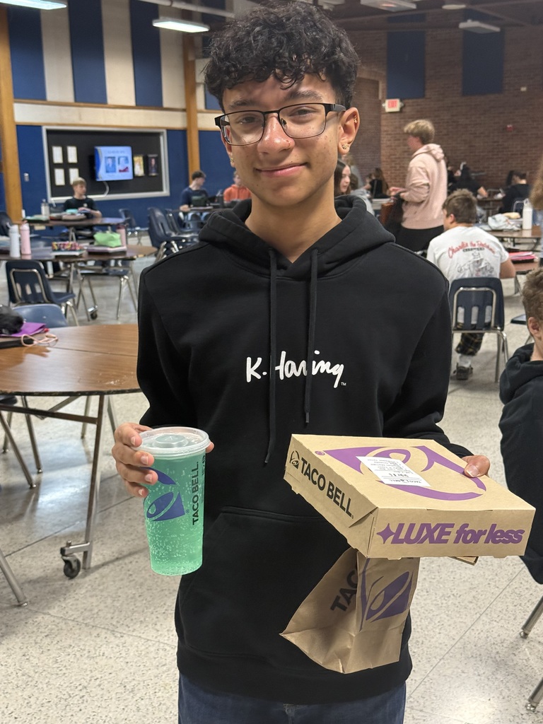 Corey Taylor is pictured with the taco bell lunch he won for having perfect attendance! 