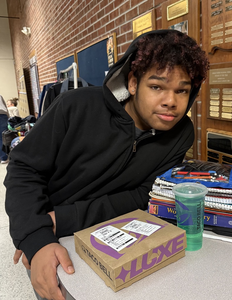 Nyre Norton is pictured with the taco bell lunch he won for having perfect attendance!