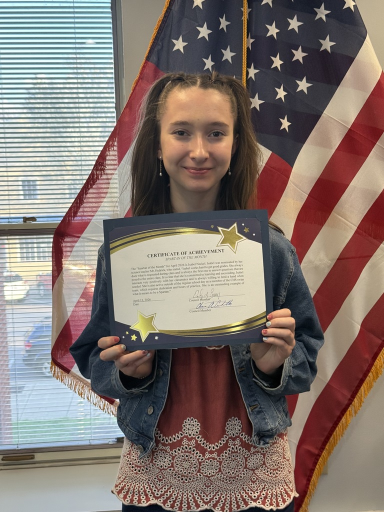 Picture of CHS Freshman, Isabel Neckel, holding her Spartan of the Month certificate.