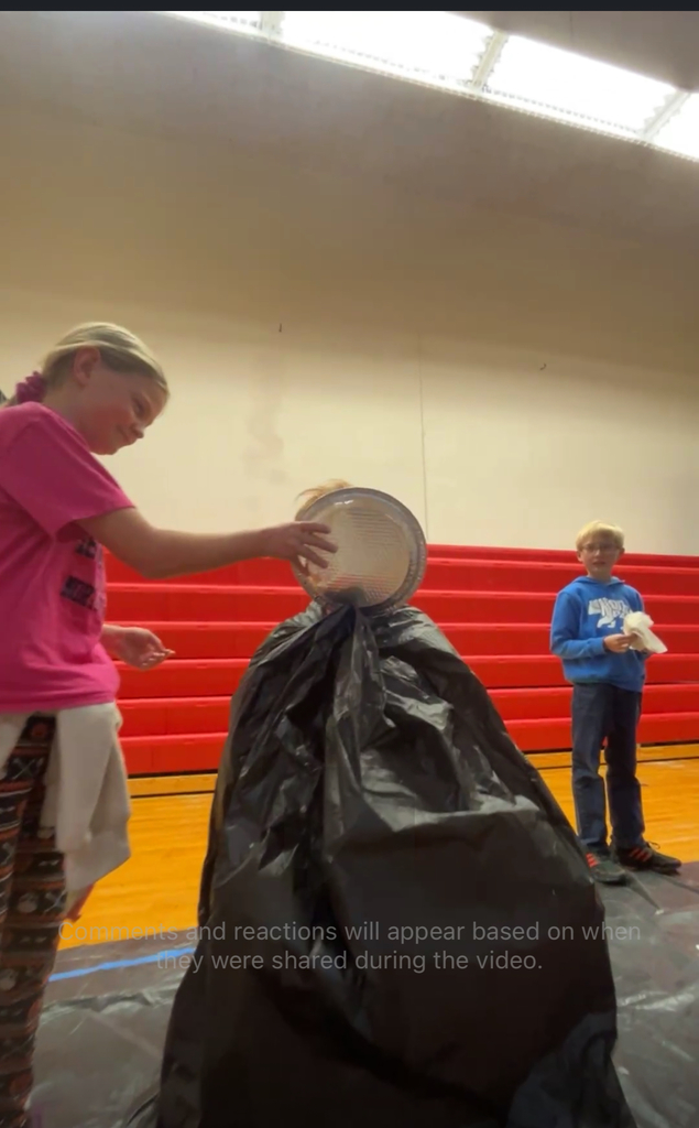 Student pieing teacher