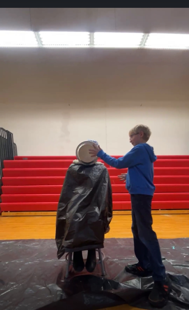 Student pieing teacher