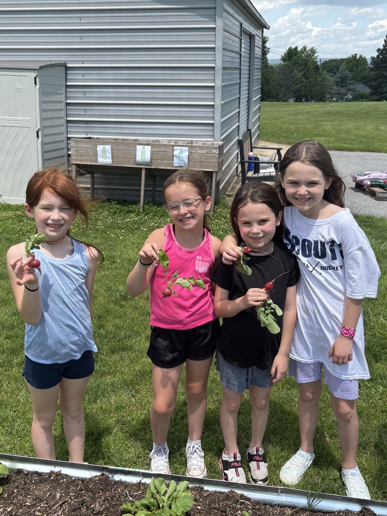 students with radishes they picked