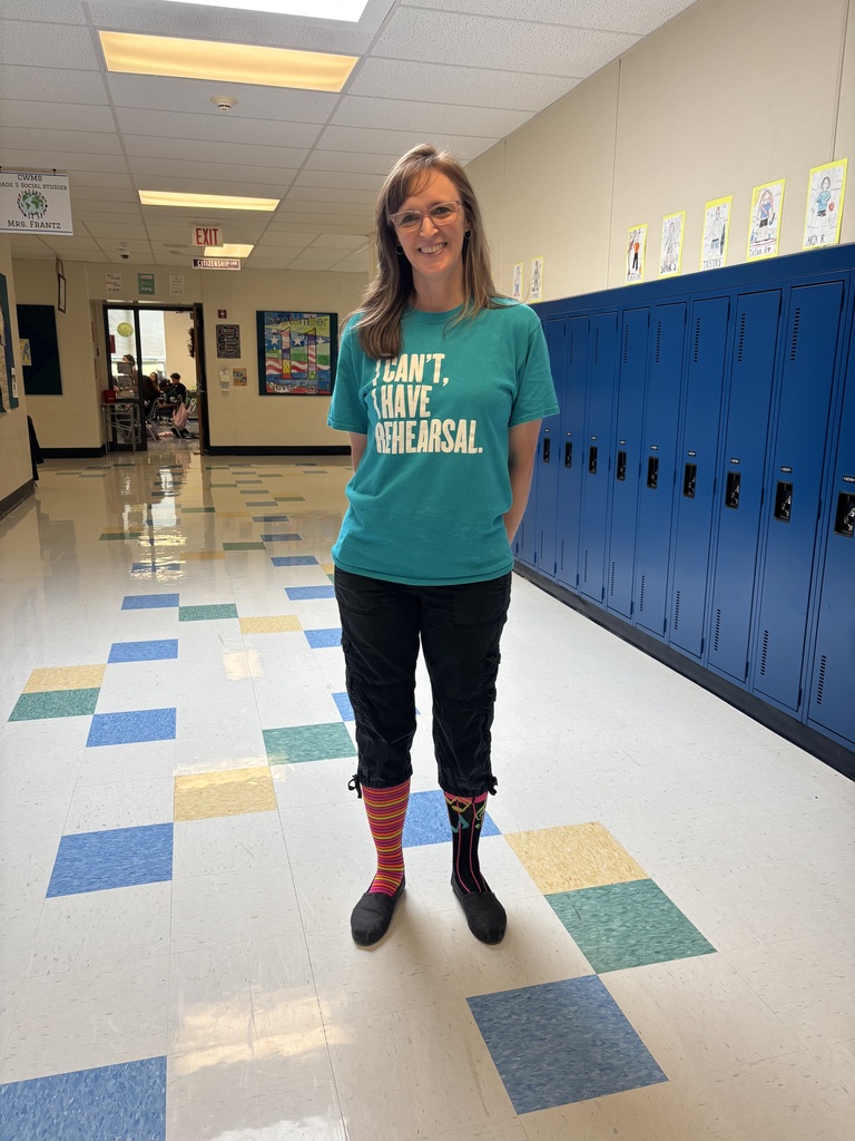 Teacher posing with crazy socks