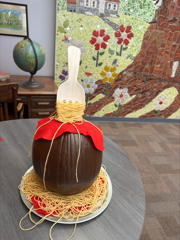 pumpkin disguised as a meatball and spaghetti