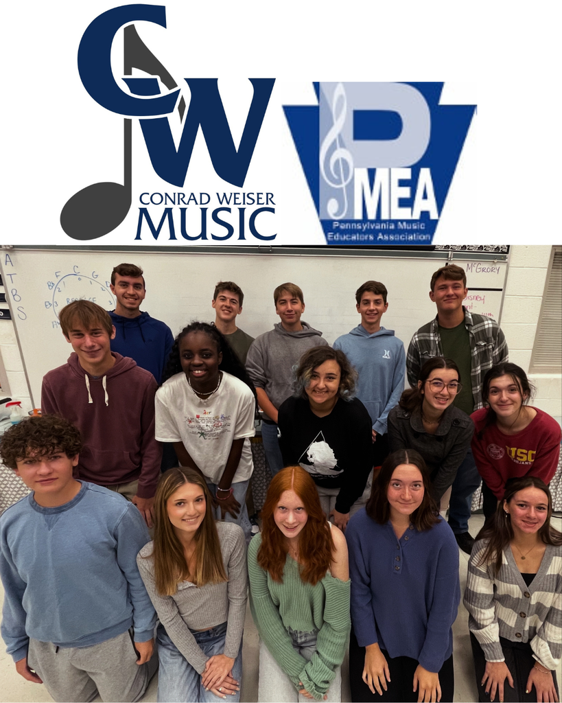 music students pictured in two rows in a classroom