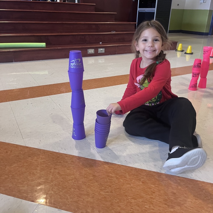 student working with speed stacks