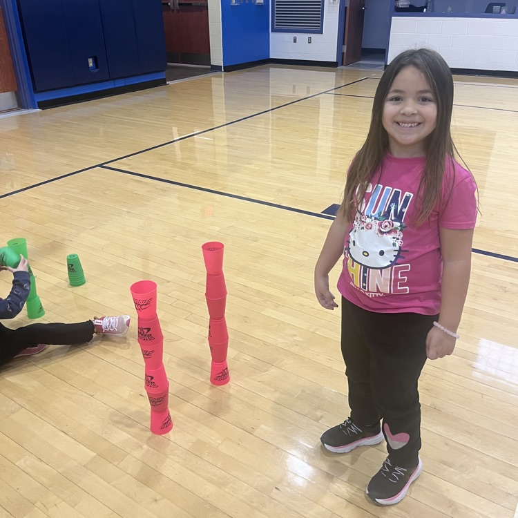 student working with speed stacks