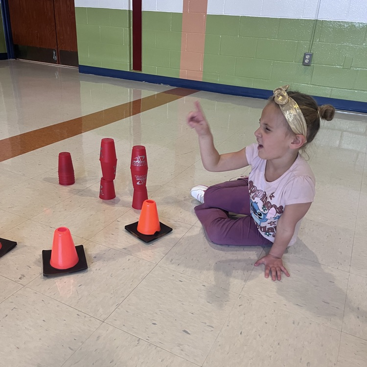 student working with speed stacks