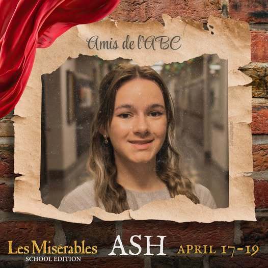 A promo graphic for Les Misérables: School Edition featuring a student cast member’s headshot. The student is centered in a softly lit indoor setting and framed within a torn parchment-style border against a brick wall background, with a red draped fabric accent in the corner. The top of the image reads “Amis de l’ABC,” and the bottom includes the show title and performance dates: April 17–19.