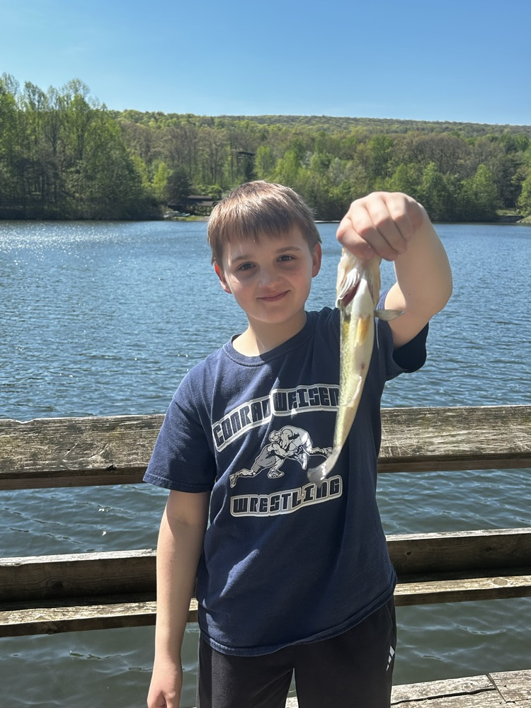 student with a fish
